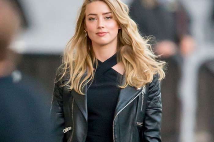 Amber Heard appears in new swimsuit selfie with a cryptic 