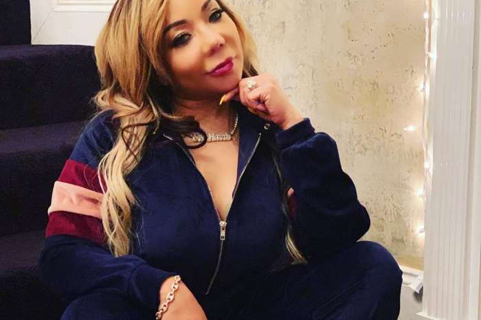 Tiny Harris Dresses As Sexy Santa For Christmas And Teases T.I. In New Photos