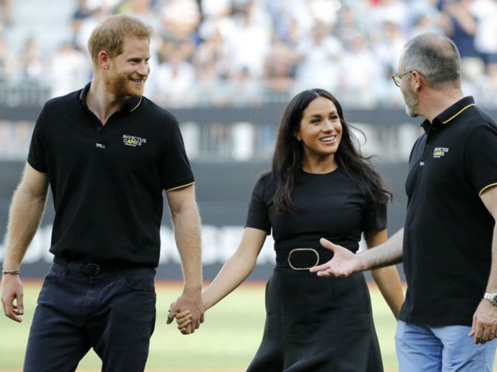 ”prince-harry-and-meghan-markle-attend-first-mlb-game-in-london-is-baby-archie-a-red-sox-or-yankees-fan”