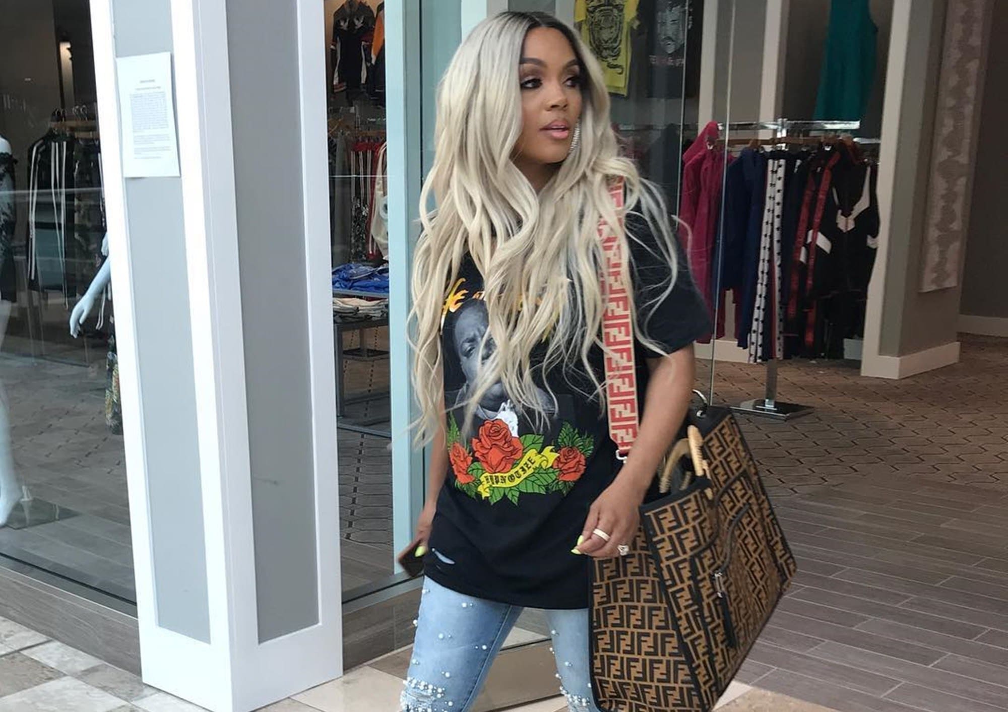 Rasheeda Frost Shows Fans Her Favorite Dress From Pressed Boutique