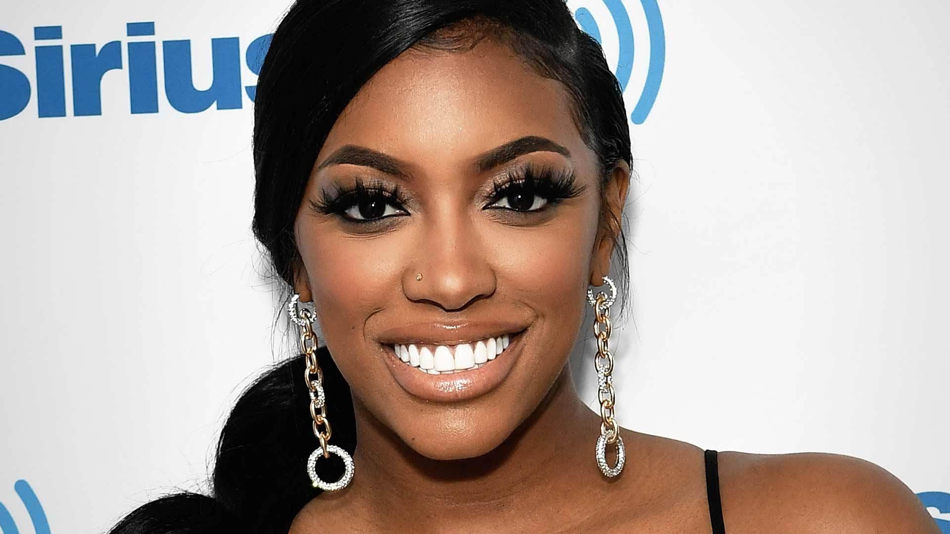 Porsha Williams' Latest Photos In A Flowy White Dress Have Fans In Awe
