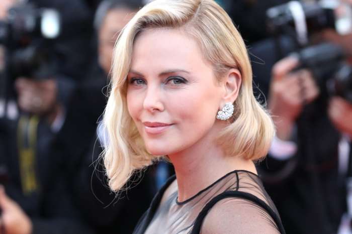 Charlize Theron Posts Photo Of Daughter Jackson In Red Dress During Vacation -- The Reactions Took An Unexpected Turn