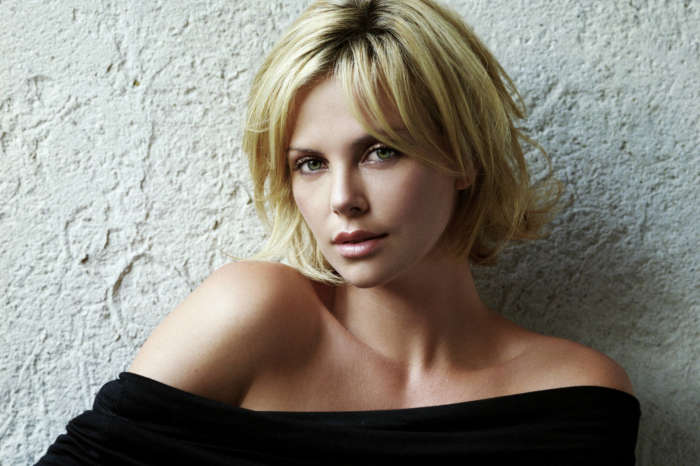 Charlize Theron Jokingly Reveals She Stole Her Pixie Cut Idea From Megan Rapinoe