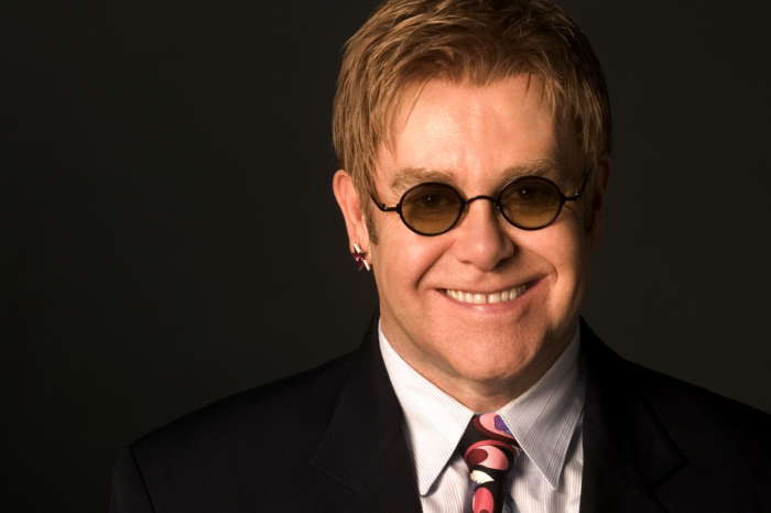 Elton John Reportedly Knew About Meghan And Harry's UK Exit Before The Queen
