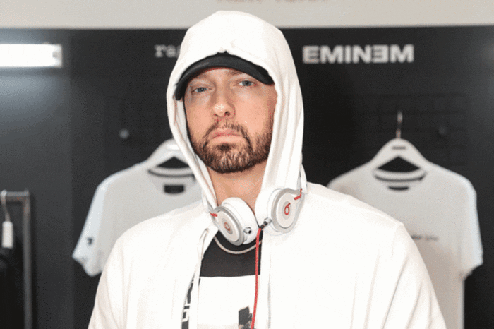 Eminem Takes On The Dolly Parton Challenge With This Controversial Grindr Photo