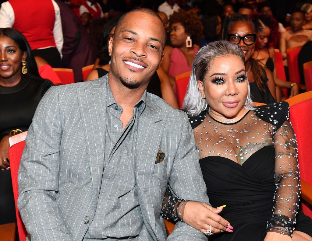 T.I. And Tiny Harris Match In Nipsey Blue Outfits And They Look Amazing At An Important Event