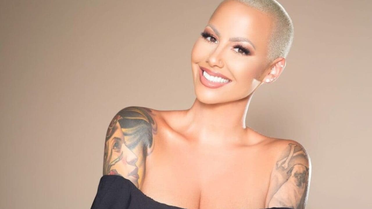 Model Amber Rose gets a face tattoo of her kids names  and its epic