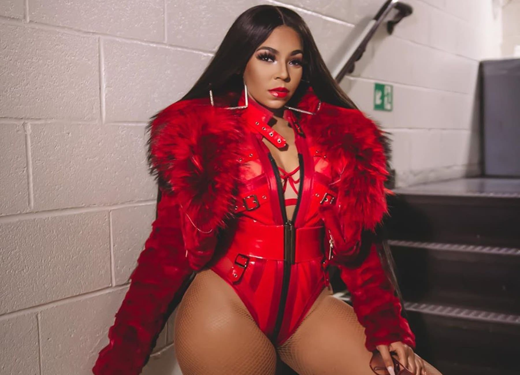 Ashanti Debuts Fiery Red Hair And Rocks Skimpy Outfit In Photos From