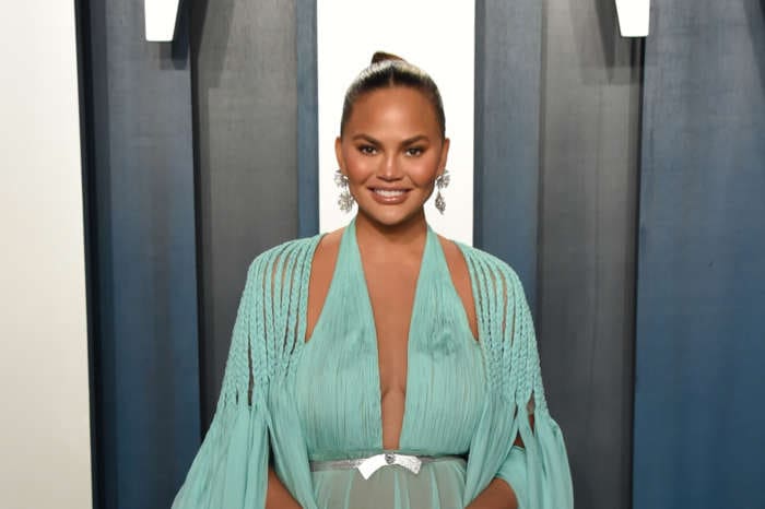 Chrissy Teigen Body-Shamed After Sharing Thirst Trap Vid Of Her In A Plunging Bathing Suit - She Claps Back!