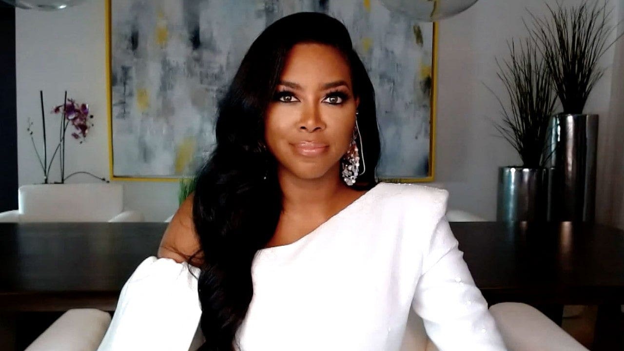 Kenya Moore Stuns In A Yellow Dress With A Deep Cut - Check Out The RHOA Star's Look