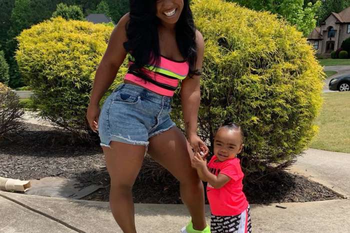 Reginae Carter Makes Fans Smile With This Photo Of Reign Rushing