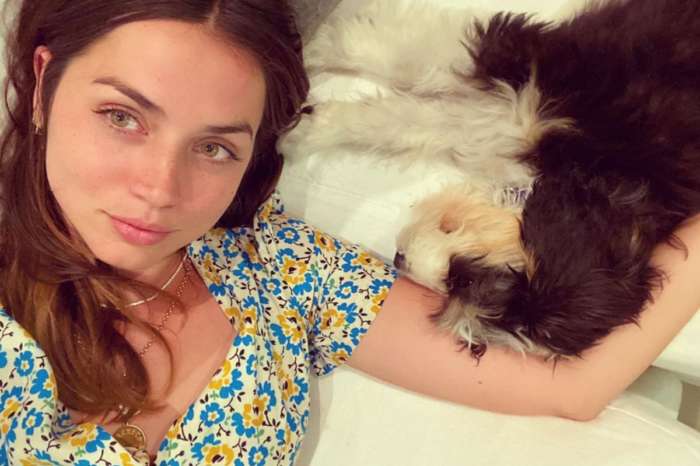 Ana De Armas Wears Floral Print HVN Dress As She Snuggles With Her Puppy
