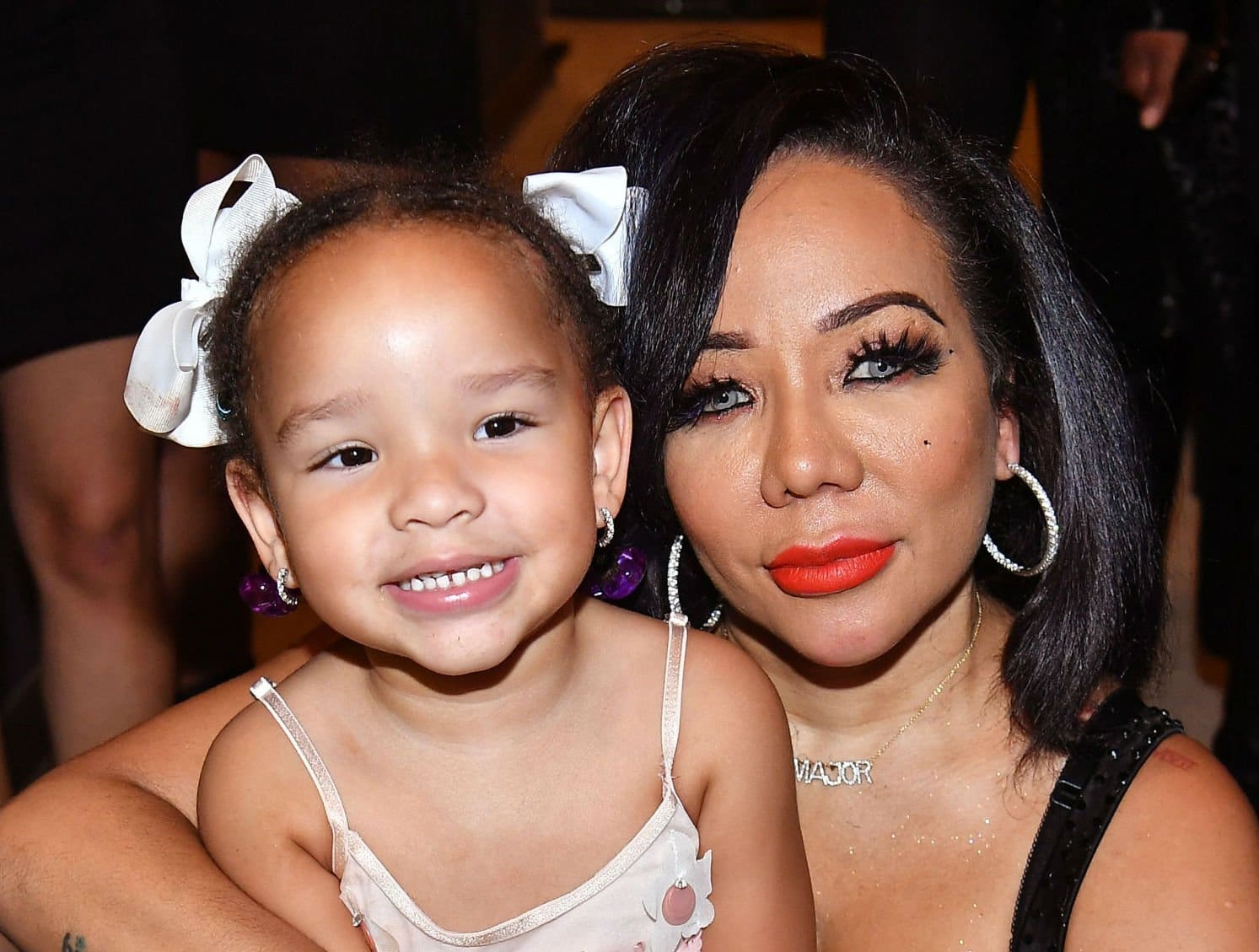 T.I. And Tiny Harris' Daughter, Heiress Harris Is The Funniest In This Clip - Check her Out Wearing A Blonde Wig!