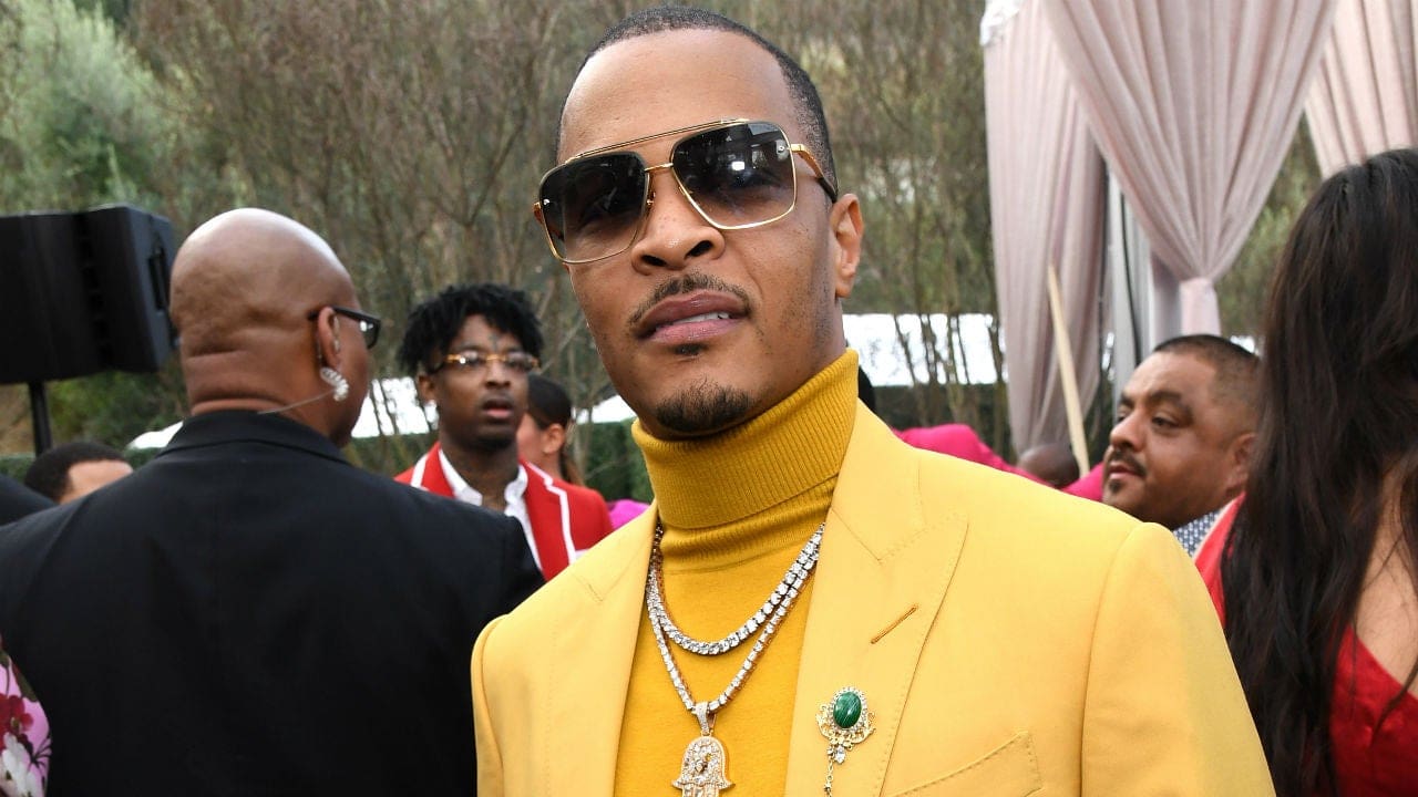 T.I. Receives Backlash From Fans After Posting This Photo: 'What Kind Of Vibe Is This For A Married Man?'