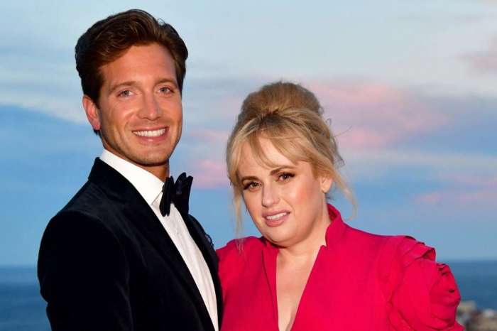 Rebel Wilson And Her BF Jacob Busch Pack The PDA In Cute Beach Video - Check Out Her Stunning Strapless Bathing Suit!