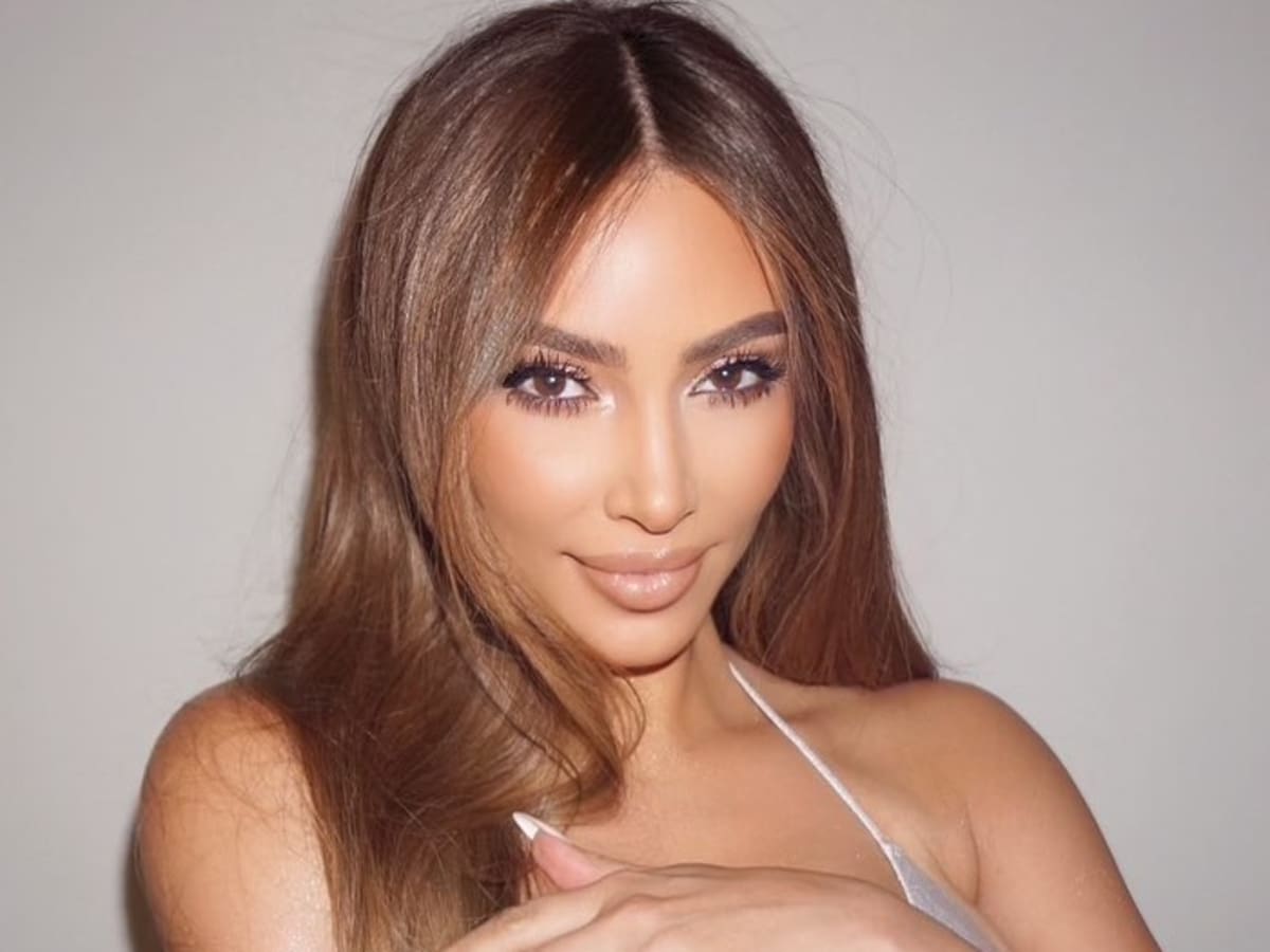 Kim Kardashian Flaunts Her Curves In Skin Tight Wetsuit — See The Look