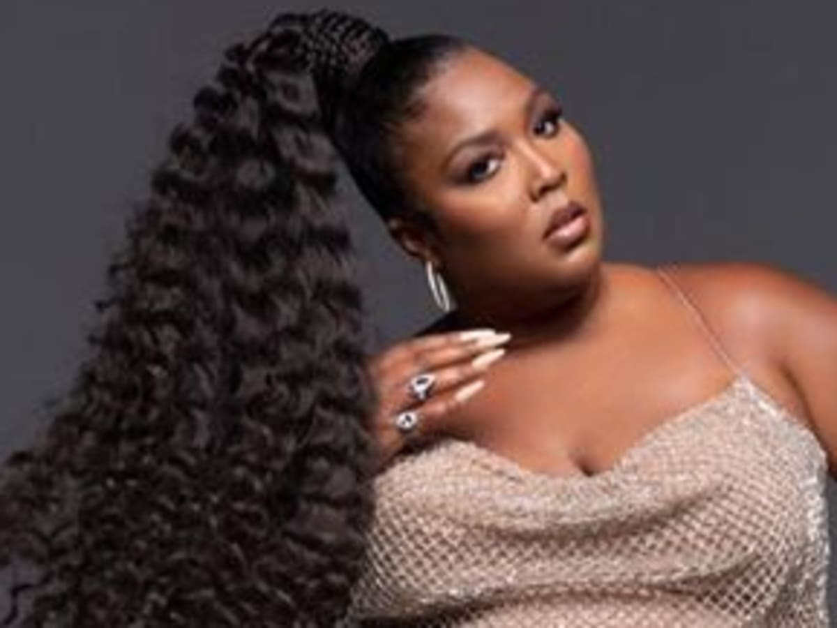 ”lizzo-puts-her-beach-body-on-full-display-in-prettylittlething-snake-two-piece-bathing-suit”