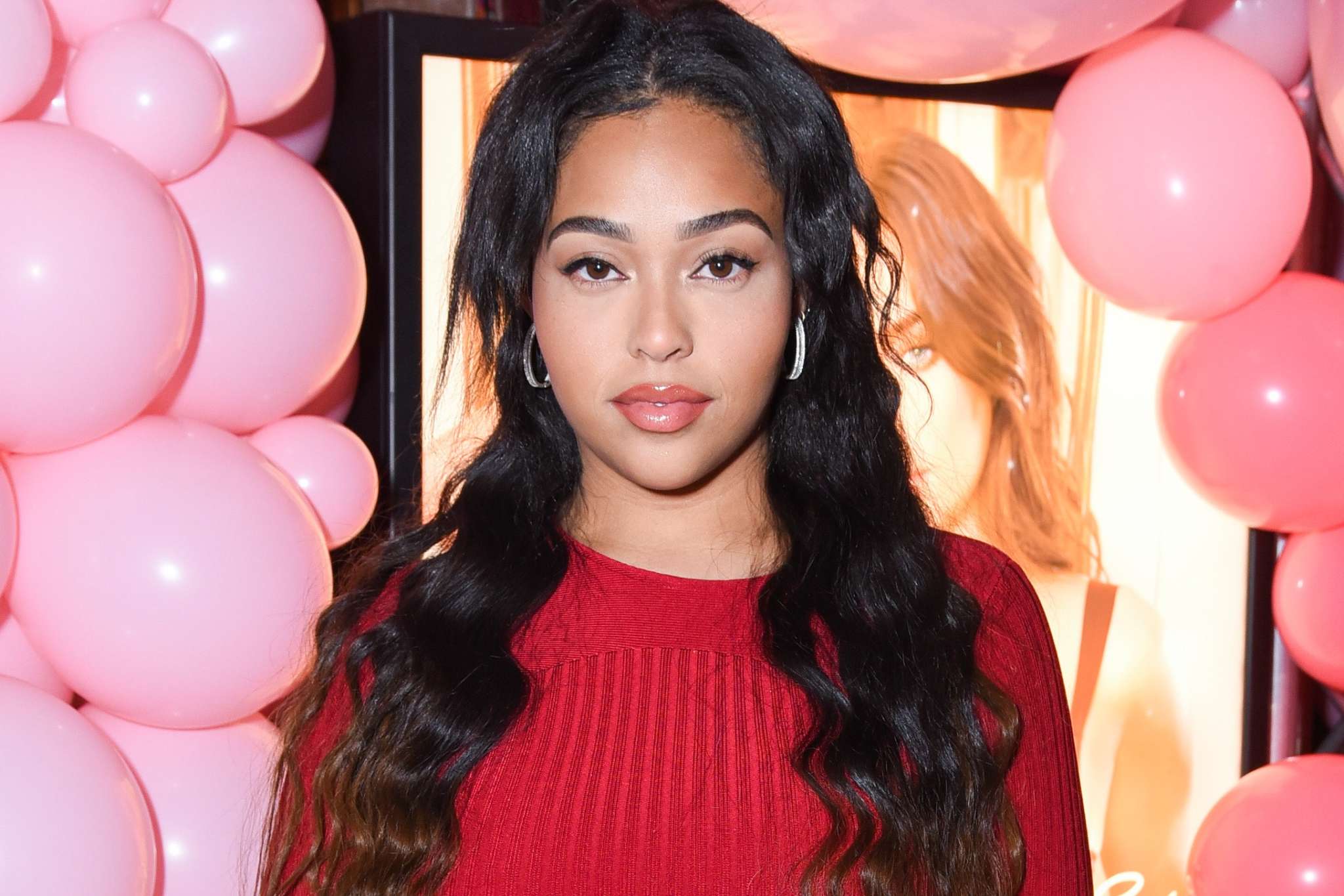 Jordyn Woods Is Glowing In Her Latest Photo - Check Her Out Driving This Red Beauty
