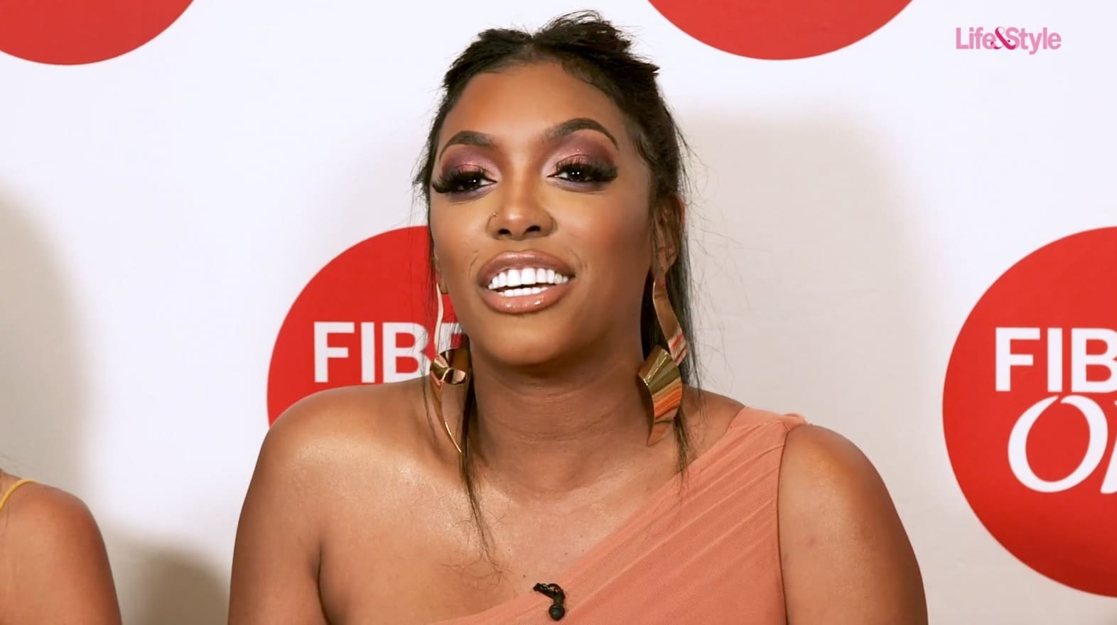 Porsha Williams Drops Her Clothes To Become An Extragavent Gift Under The Christmas Tree - See Her Photo Here