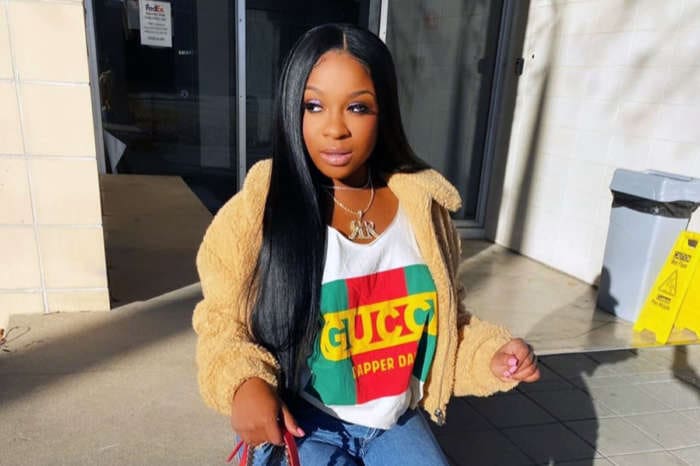 Reginae Carter Wishes A Happy Birthday To Robert Rushing, And All Fans See Is Her Bold Look In The Family Photo