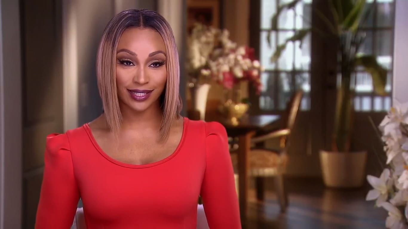 Cynthia Bailey Shows Off Her Curves By Her Lake House - Check Out Her Fire Outfit In These Photos