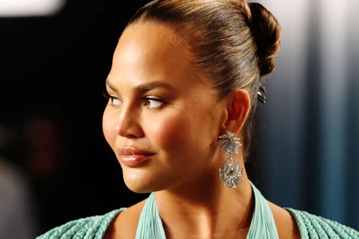 Chrissy Teigen Documents The Loss Of One Of Her Teeth After Biting Into A Roll-Up!