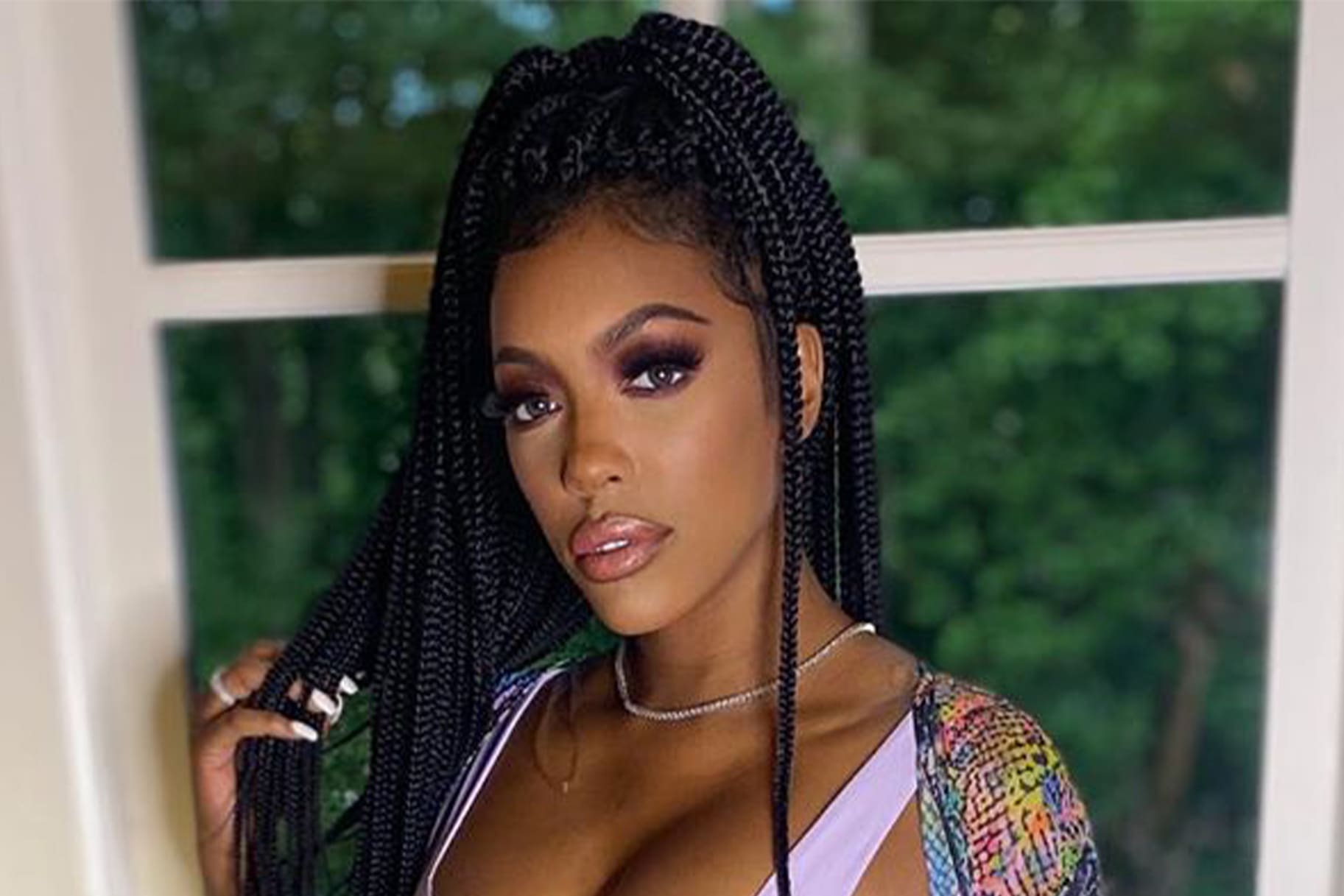 Porsha Williams Poses In A Gucci Swimsuit In 2021