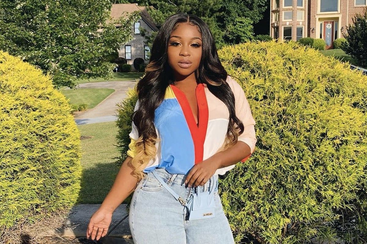 Reginae Carter Flaunts Her Toned Body In A White Savage X Fenty Outfit