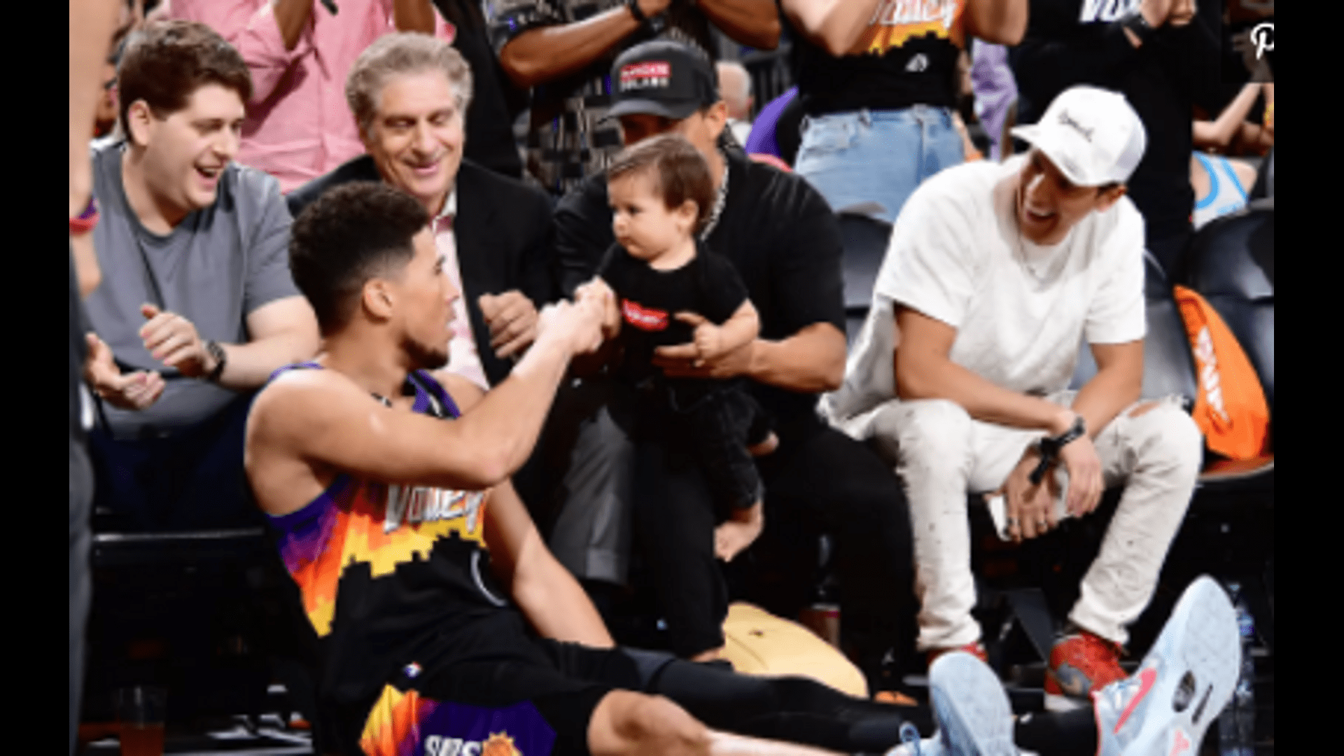 Devin Booker punched a child in the stands after an incredible throw