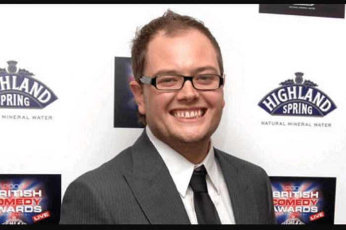 Alan Carr seen shaking Hands with guy companion after Paul Drayton split