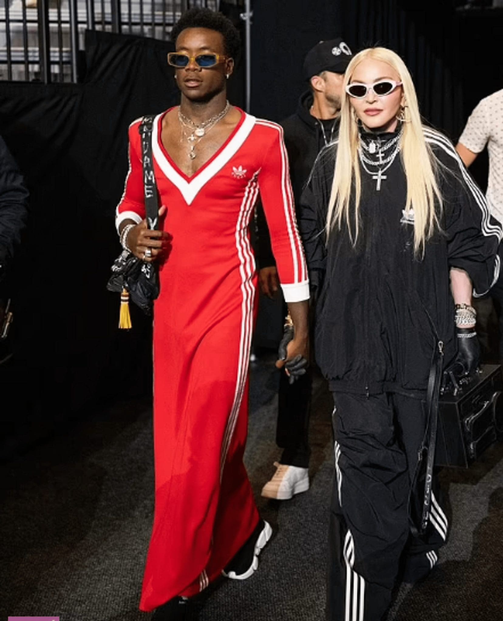 Madonna's son wears a tight red Adidas x Gucci dress to a boxing competition