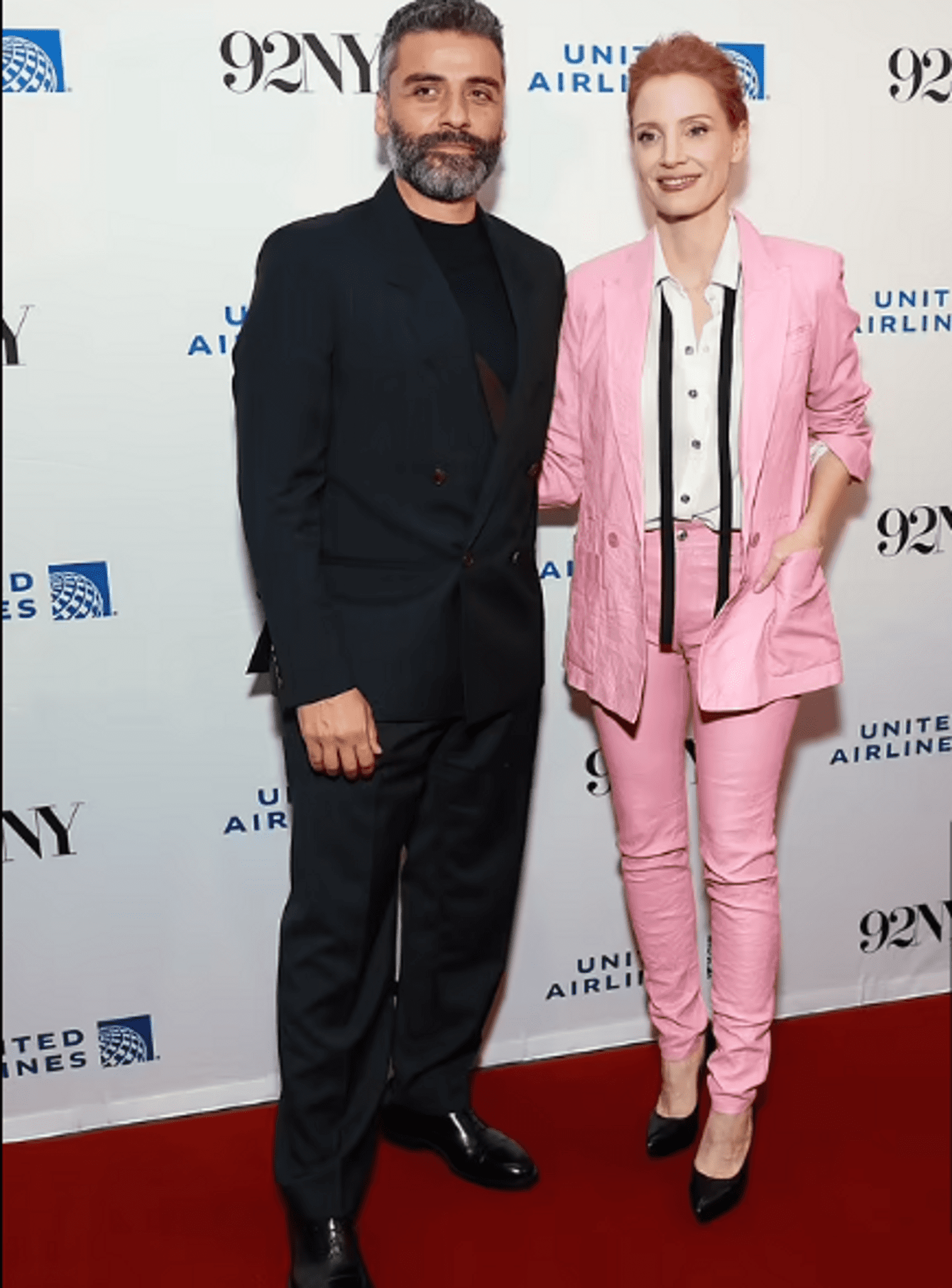 Check out Jessica Chastain in a pink suit that matches her hair color amazingly