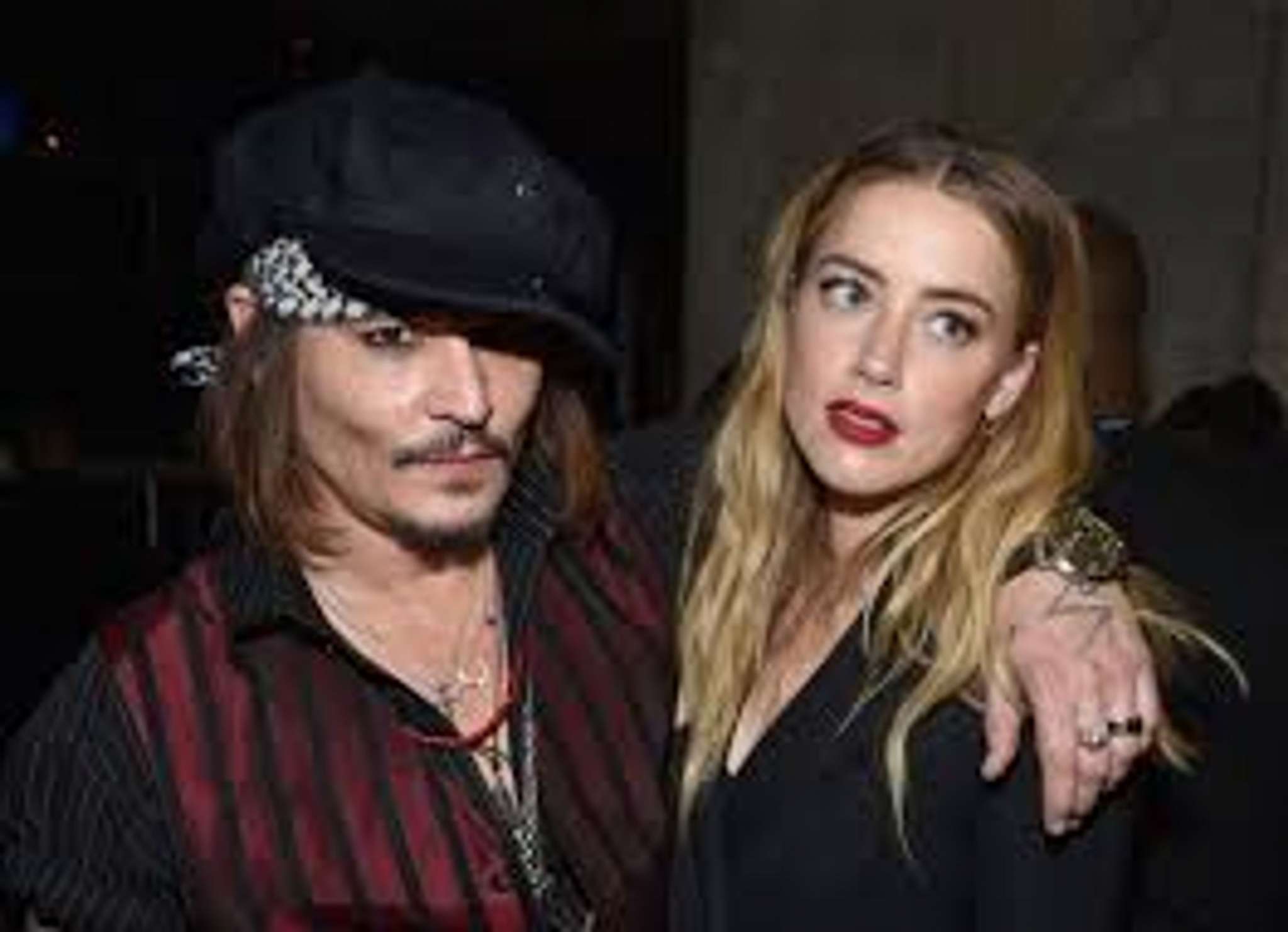 Amber Heard is writing a book about her shady marriage to Johnny Depp