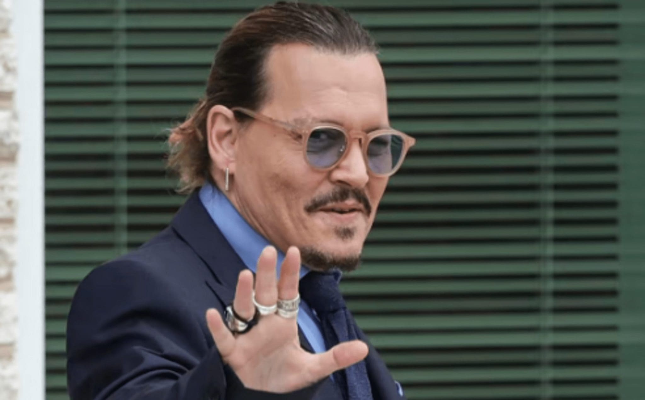 Johnny Depp warns his army of fans: 'Fake accounts are impersonating me'