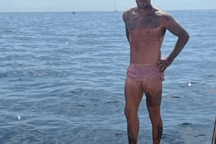 While On A Yacht Holiday With His Family, David Beckham Flaunts His Muscles And Tattoos In A Pink Parachute Bikini