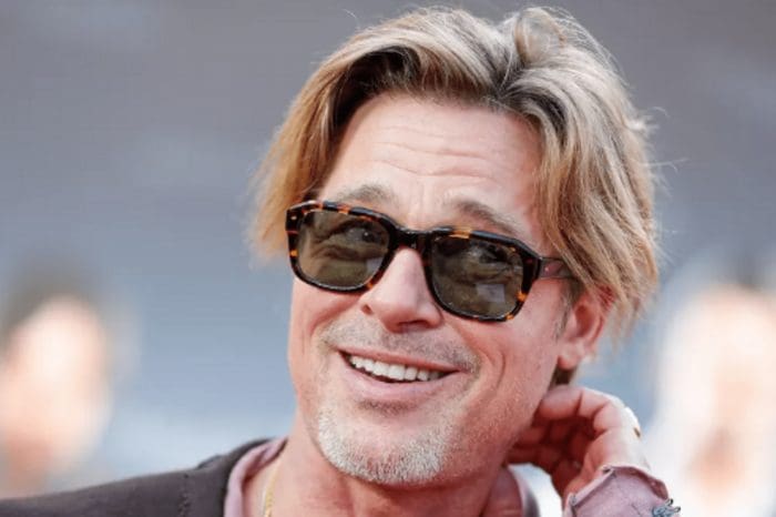 Brad Pitt Appeared On The Red Carpet Wearing A Distinctive Hairdoo And A Casual LongSleeve