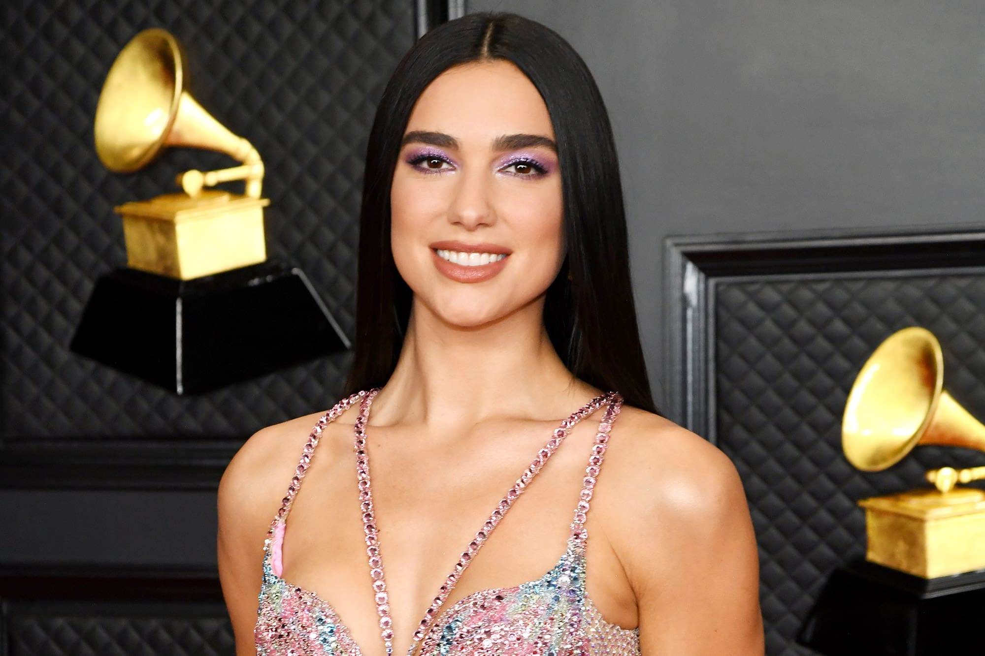 Dua Lipa Brings New Style Of Wedding Guest Attire With Sheer Slip And Thigh High Metalic Boots