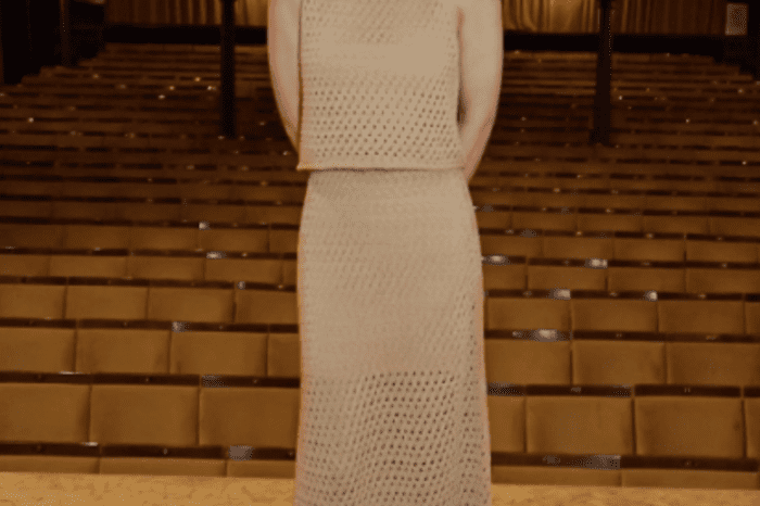 Slimmer Emilia Clarke looks stunning in a sandy knit suit
