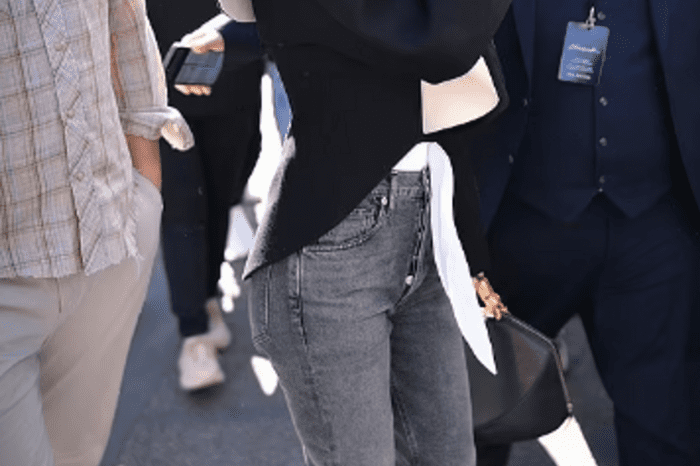 Emma Watson came to the Schiaparelli show in ripped jeans and a designer jacket