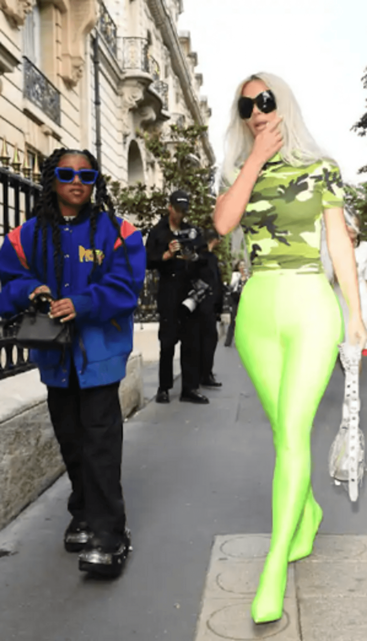 Kim Kardashian pairs lime with khaki at Paris Fashion Week