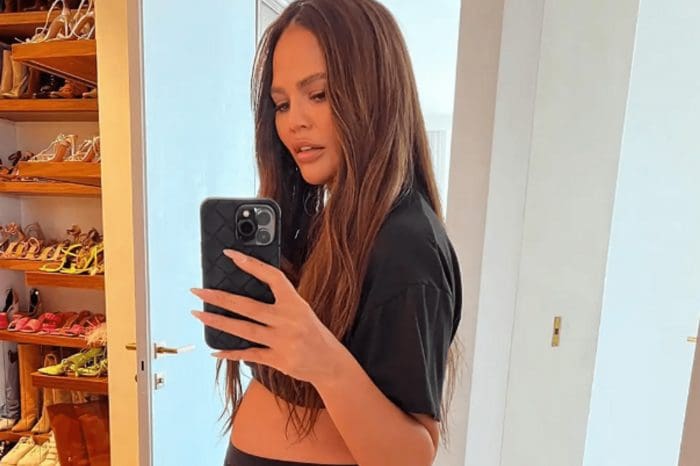 Chrissy Teigen Announces Her Pregnancy While Wearing $520 Sheer Gucci Panties