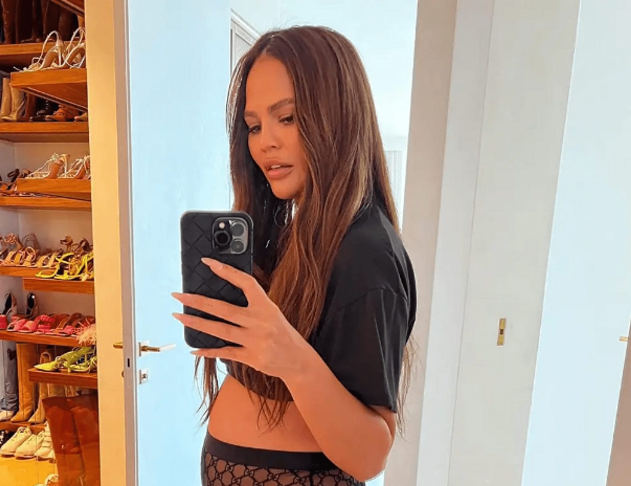 Chrissy Teigen Announces Her Pregnancy While Sporting $520 Sheer Gucci Panties