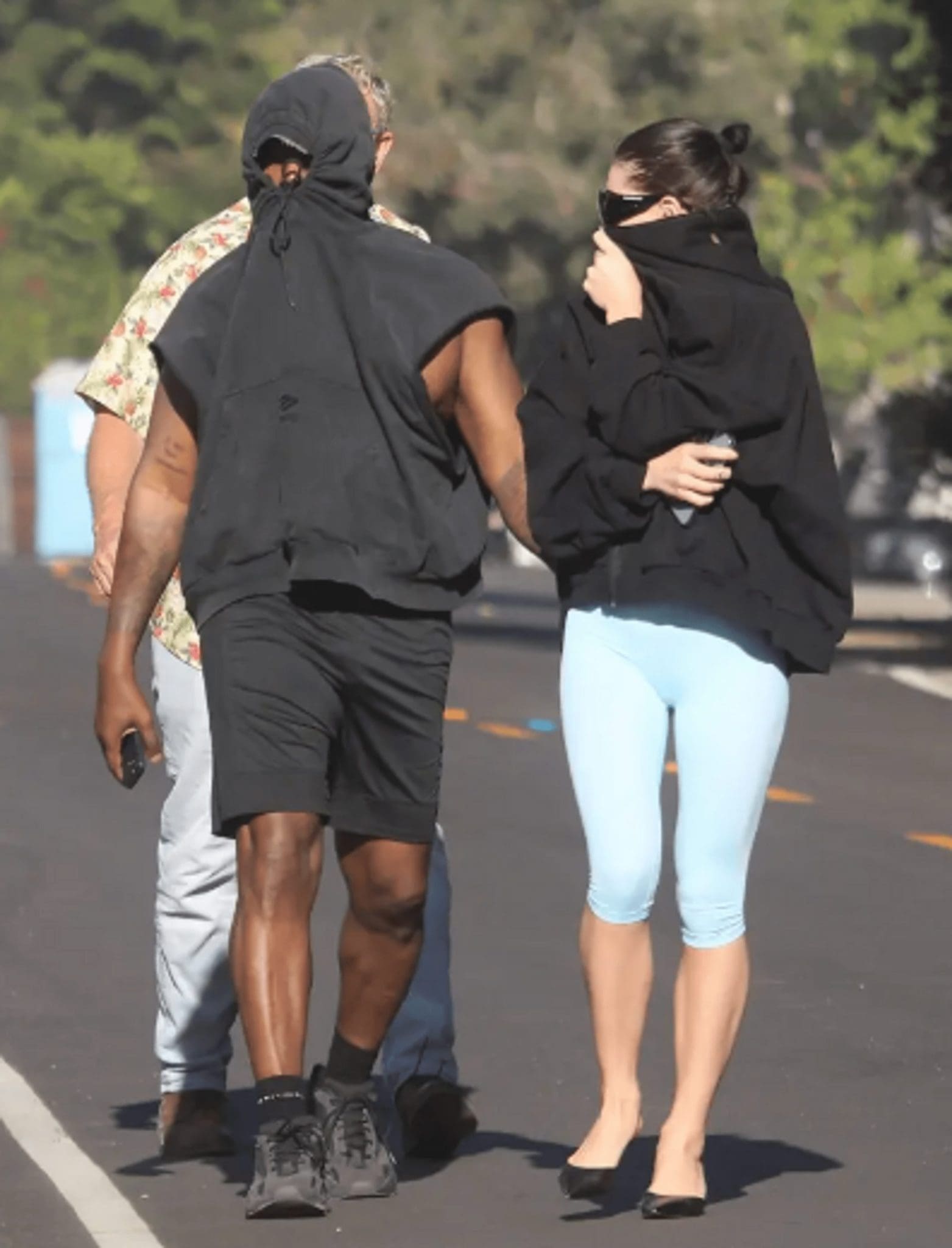 At His Malibu Home, Kanye West Meets With Designers And Builders Beside An Unidentified Woman