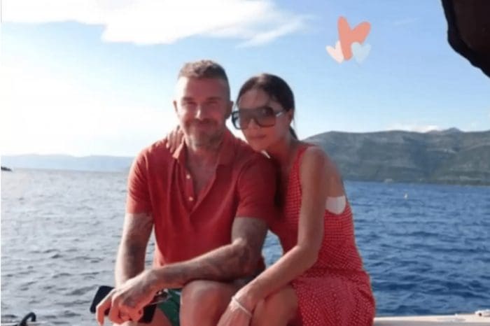 Victoria Beckham And David Beckham Take A Vacation Photo Wearing Identical Coral Clothing