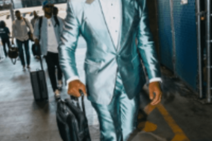When Russell Wilson Wears This Metallic Suit, Fans Can't Look Away