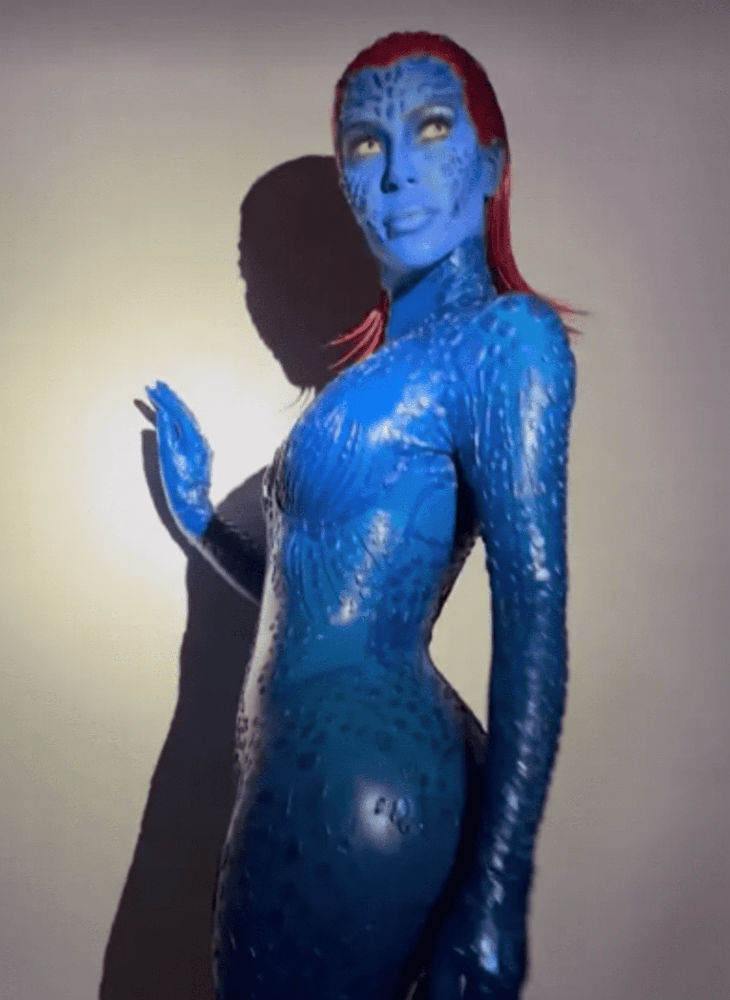 Kim Kardashian dressed as the enigmatic Mystique from X-Men on Halloween.