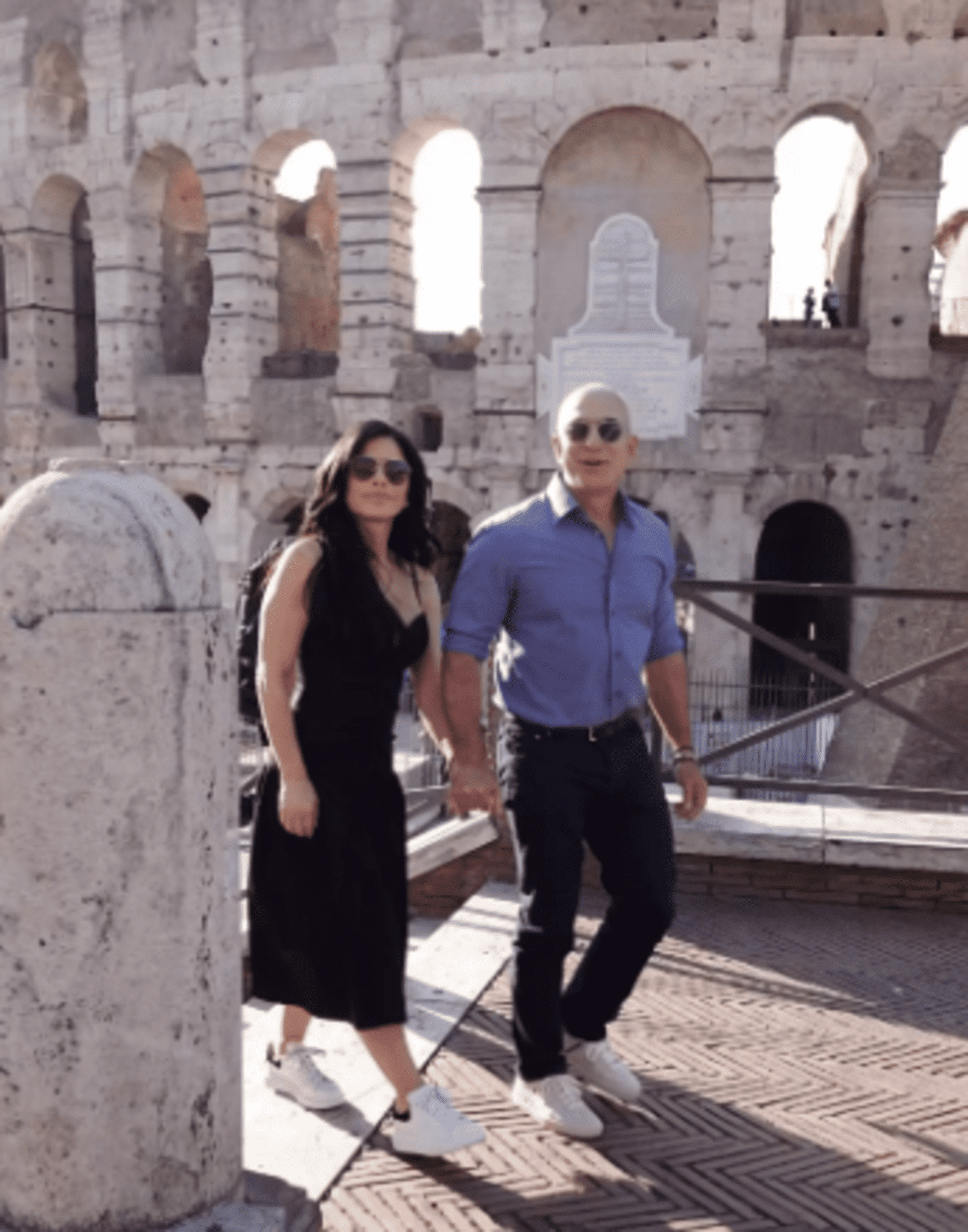 Holding hands at the Colosseum in Rome, Jeff Bezos and Lauren Sánchez appear to be having a good time on their vacation.