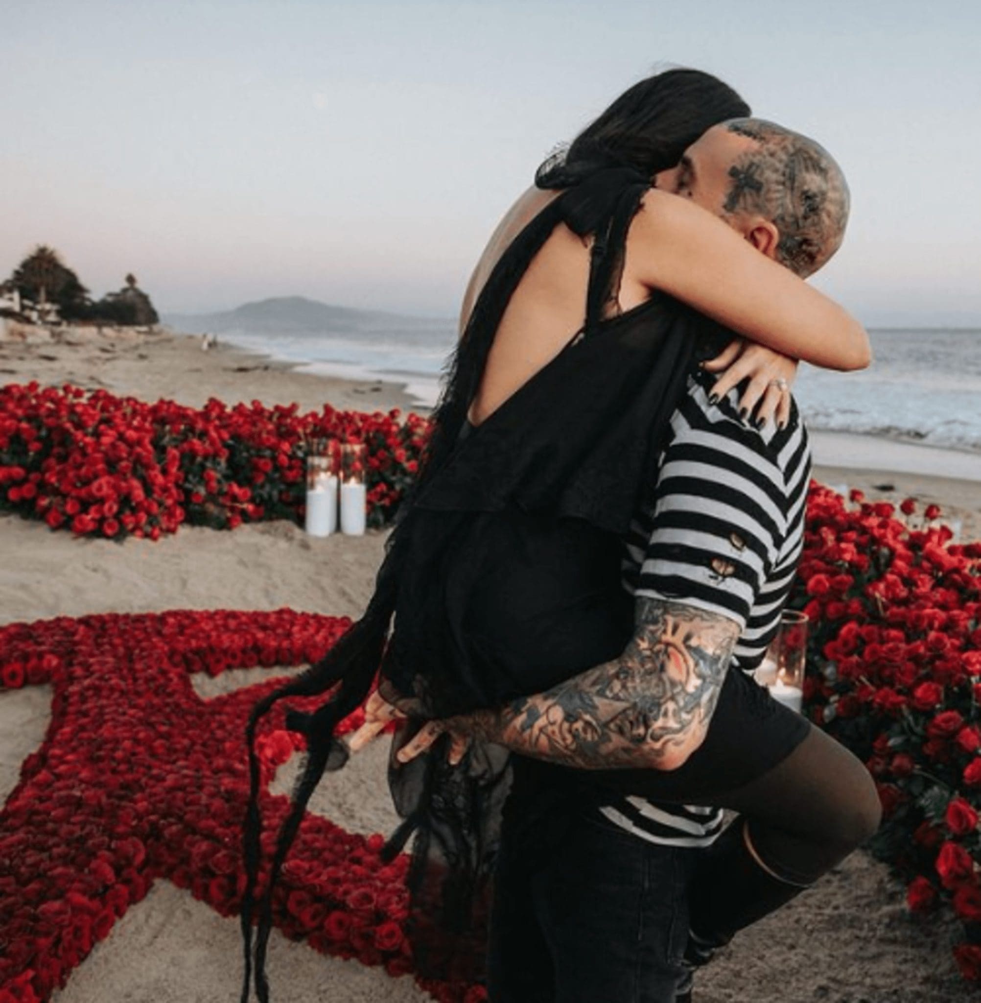 On the one year anniversary of Travis Barker's proposal, Kourtney Kardashian threw a celebration complete with throwback photos.